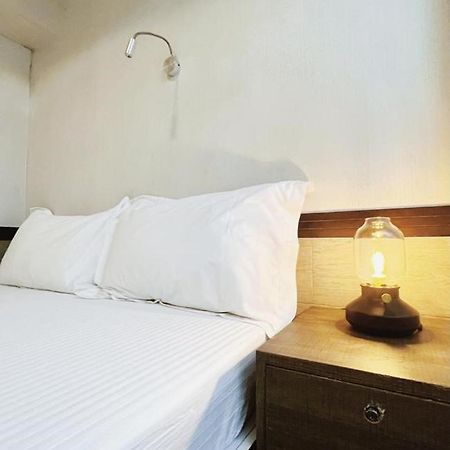 Island Inn Цзюлун Экстерьер фото